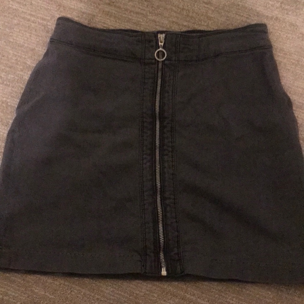 Cute zipped up skirt.